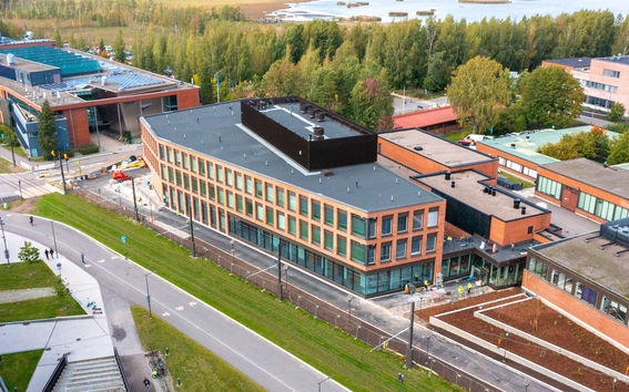 An aerial image from early autumn of a new building soon to be finished on campus.