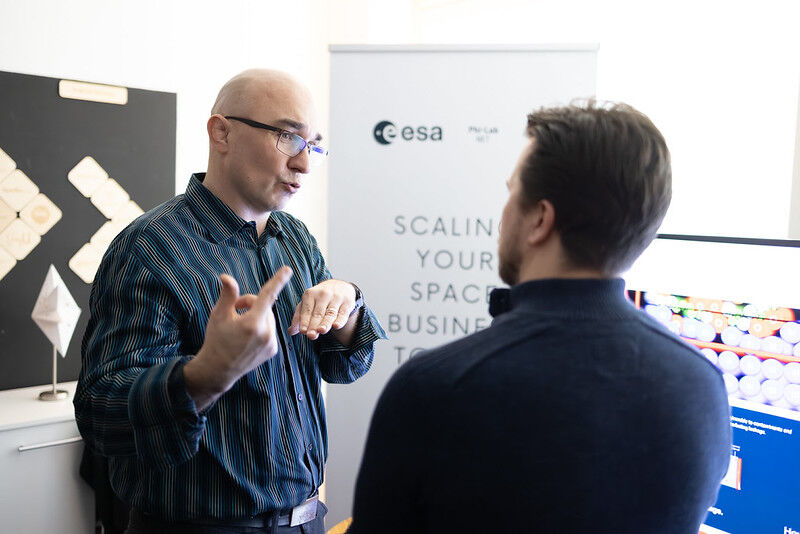 The SisuSemi team at Demo Day promoting their company to attendees