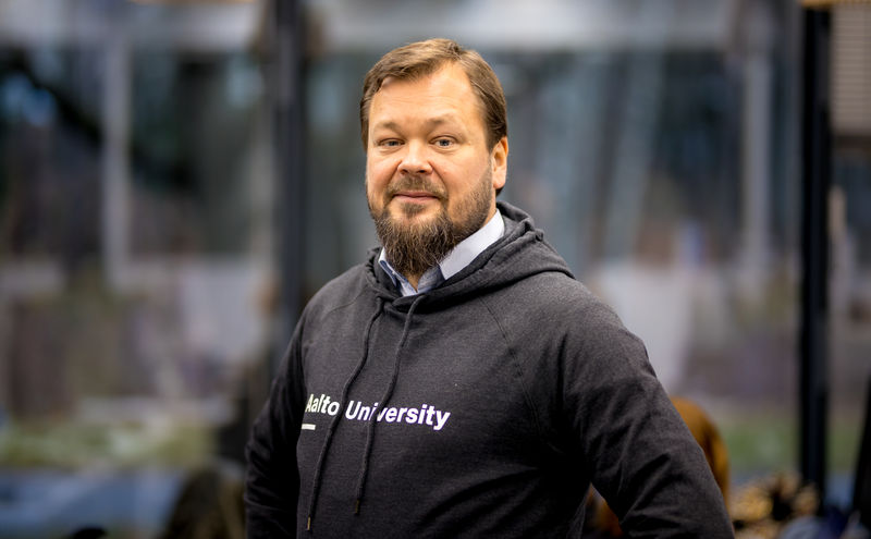 Ville Jokela Aalto CRE Managing Director smiling to the camera, wearing Aalto University hoodie. Pic: Kalle Kataila / Aalto University